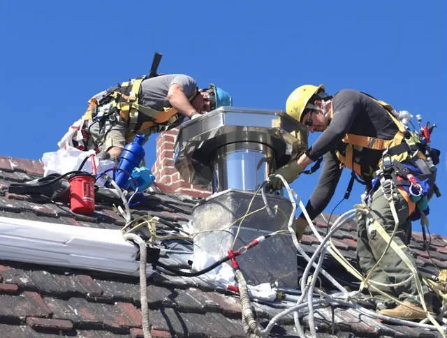 Protective chimney cap installed by Medway Chimney Sweep in Medway, MA