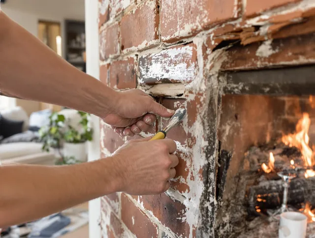 Routine fireplace repair by Medway Chimney Sweep in Medway, MA